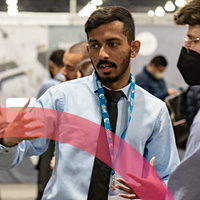 Researcher presenting his work at a meeting